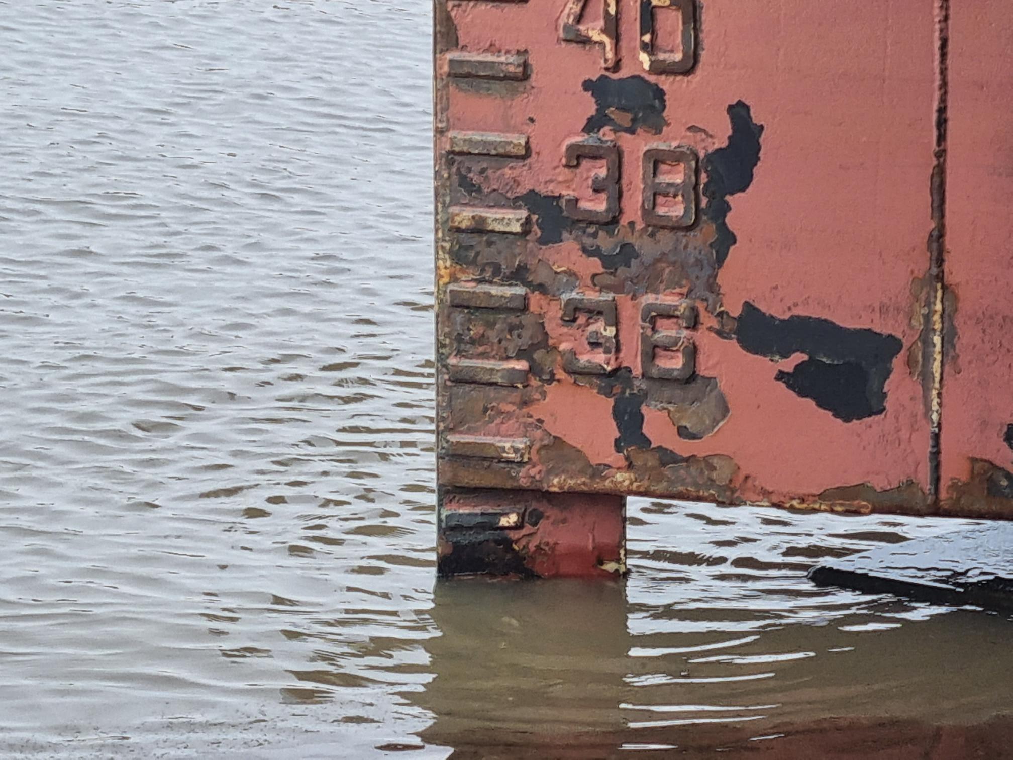 Draught marks on the rudder from a ship