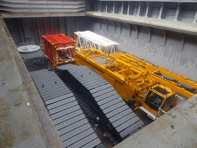 Liebherr crane in the cargo hold of a vessel